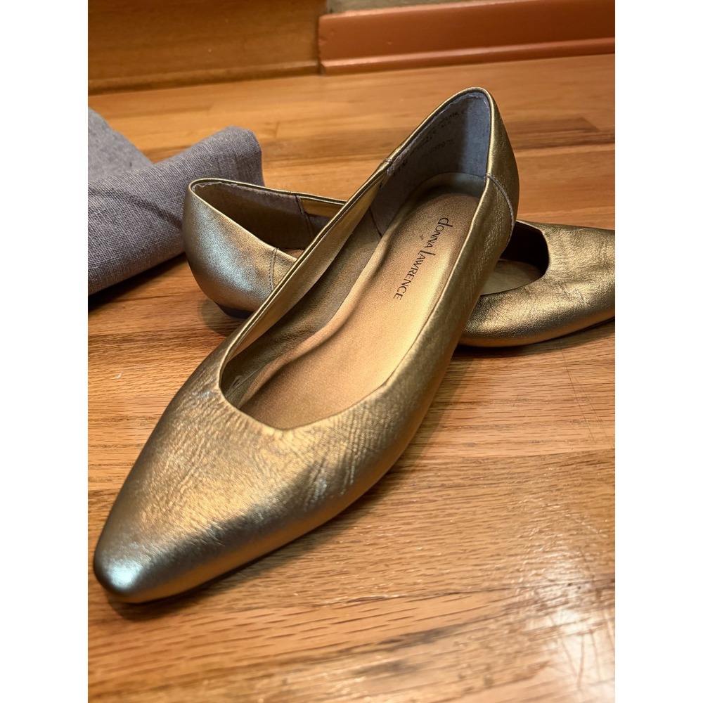 Gold tone leather flats by Donna Lawrence. Size 11